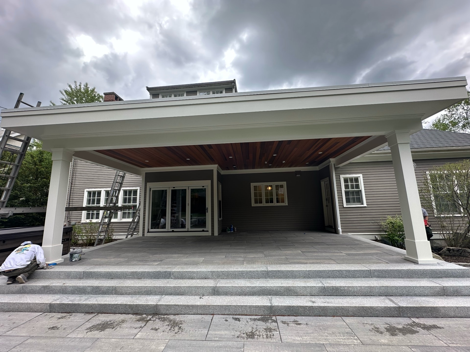 Exterior painting services by Lima Painting — patio cover and home exterior in Greater Boston MA