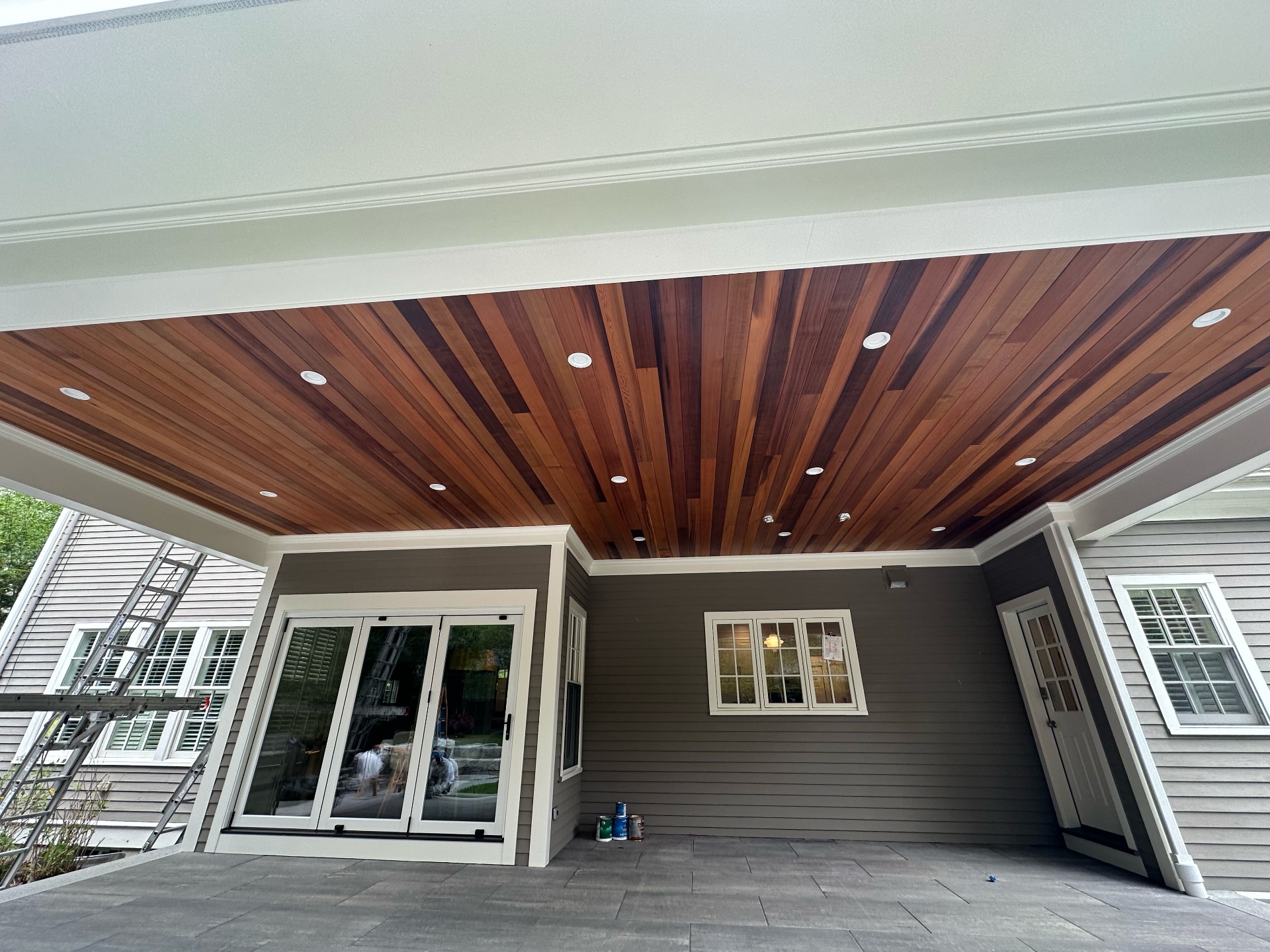 Finished exterior painting and cedar patio cover ceiling by Lima Painting in Greater Boston MA